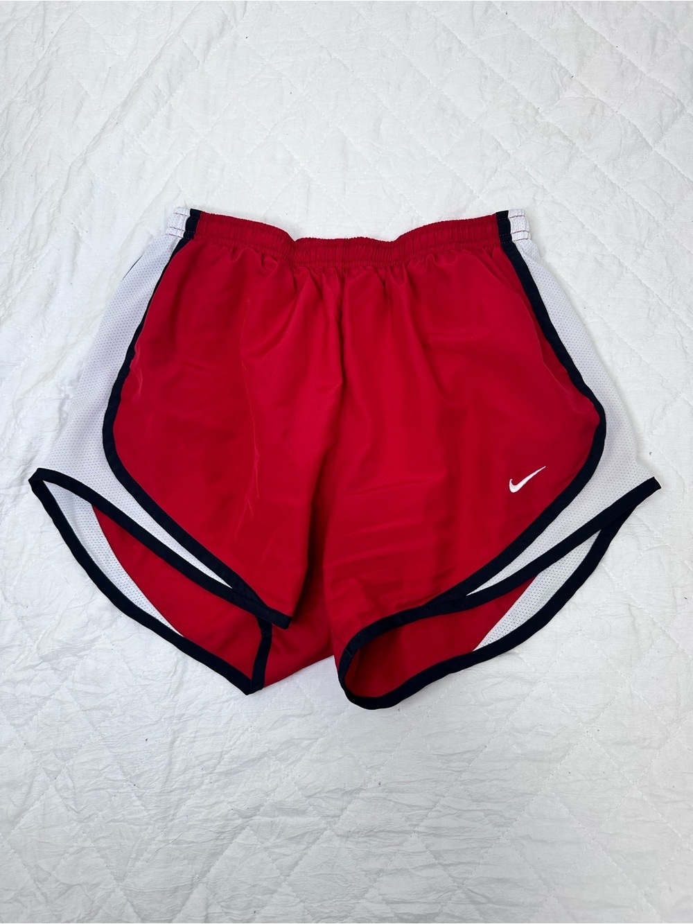 Nike Red Athletic Shorts with White Side Panels and Black Trim